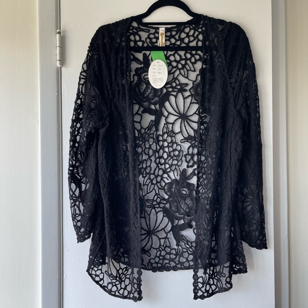 NEW black embroidered cardigan with tag attached